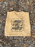 Pride is Still a Protest cropped tank