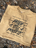 Pride is Still a Protest cropped tank